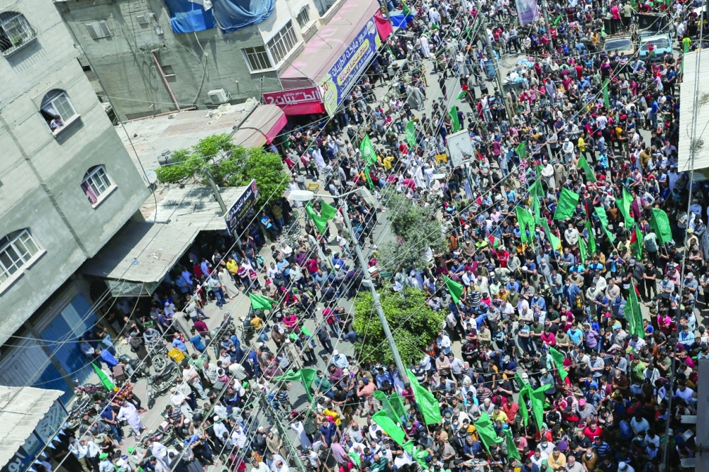احتفالات فلسطينية في غزة عقب توقيع اتفاق وقف إطلاق النار   "رويترز" 
