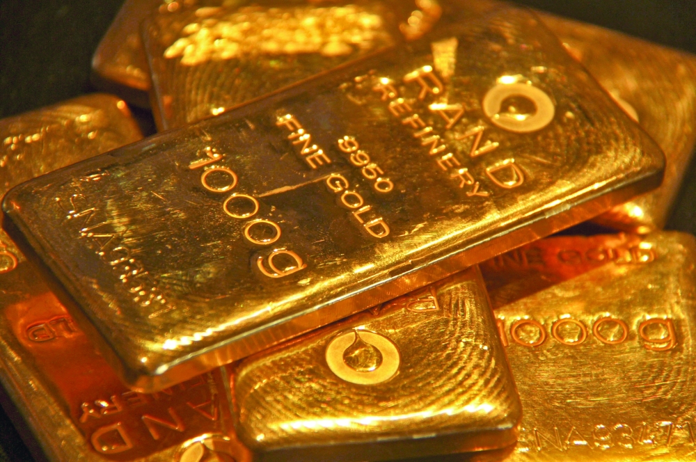 FILE PHOTO: Gold bars are displayed at a gold jewellery shop in the northern Indian city of Chandigarh