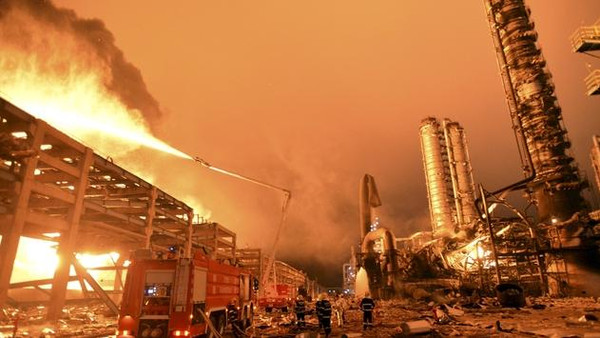 File photo of firefighters trying to extinguish a fire at a petrochemical plant in Zhangzhou