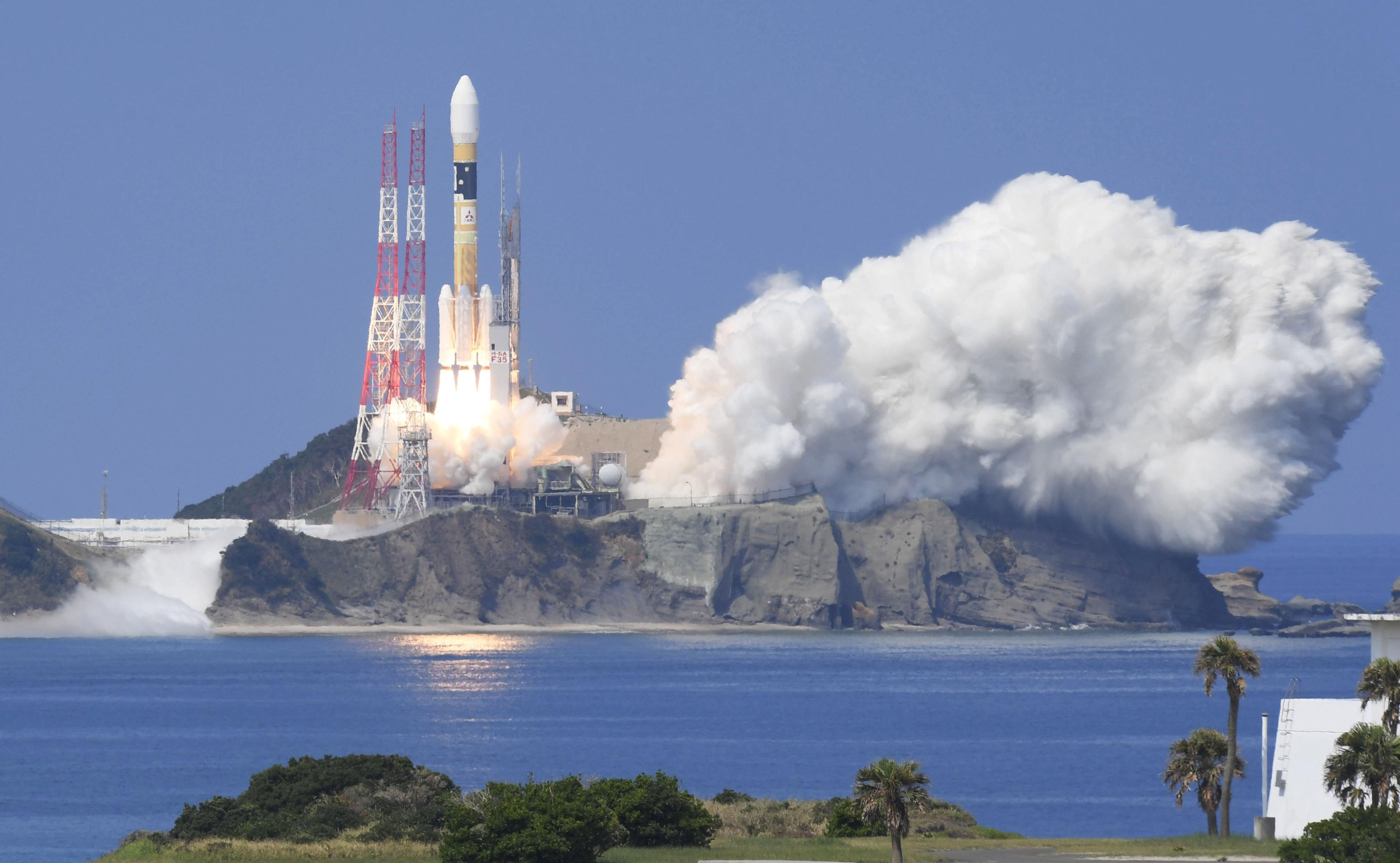 A H-IIA rocket carrying Michibiki 3 satellite lifts off from the launching pad at Tanegashima Space Center on the southwestern island of Tanegashima