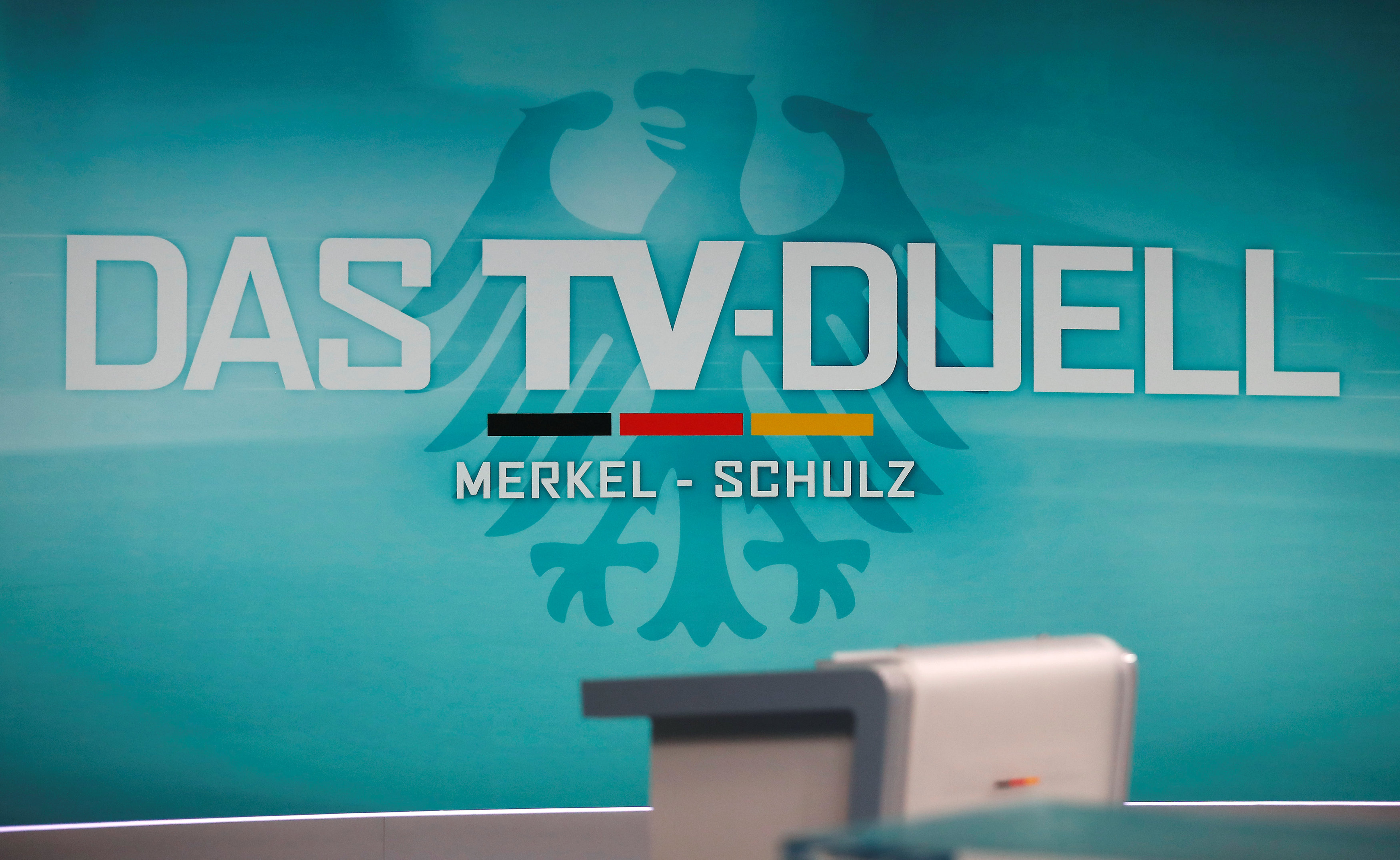 The logo and the desk for Angela Merkel are pictured at the Adlershof TV studio, before a debate between incumbent German Chancellor Angela Merkel and SPD candidate Martin Schulz collectively hosted by all German TV networks, in Berlin