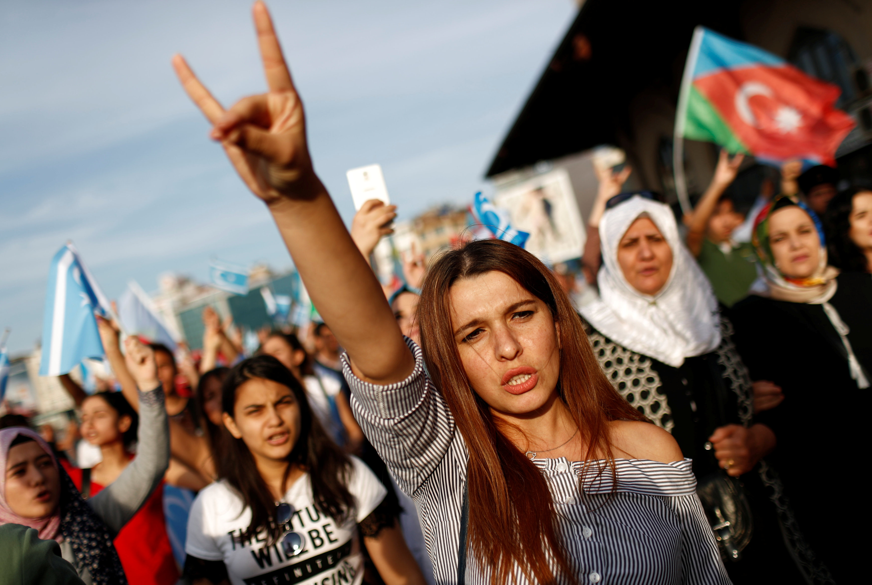 Demonstrators shout slogans during a protest against the independence referendum in northern Iraq, in Istanbul