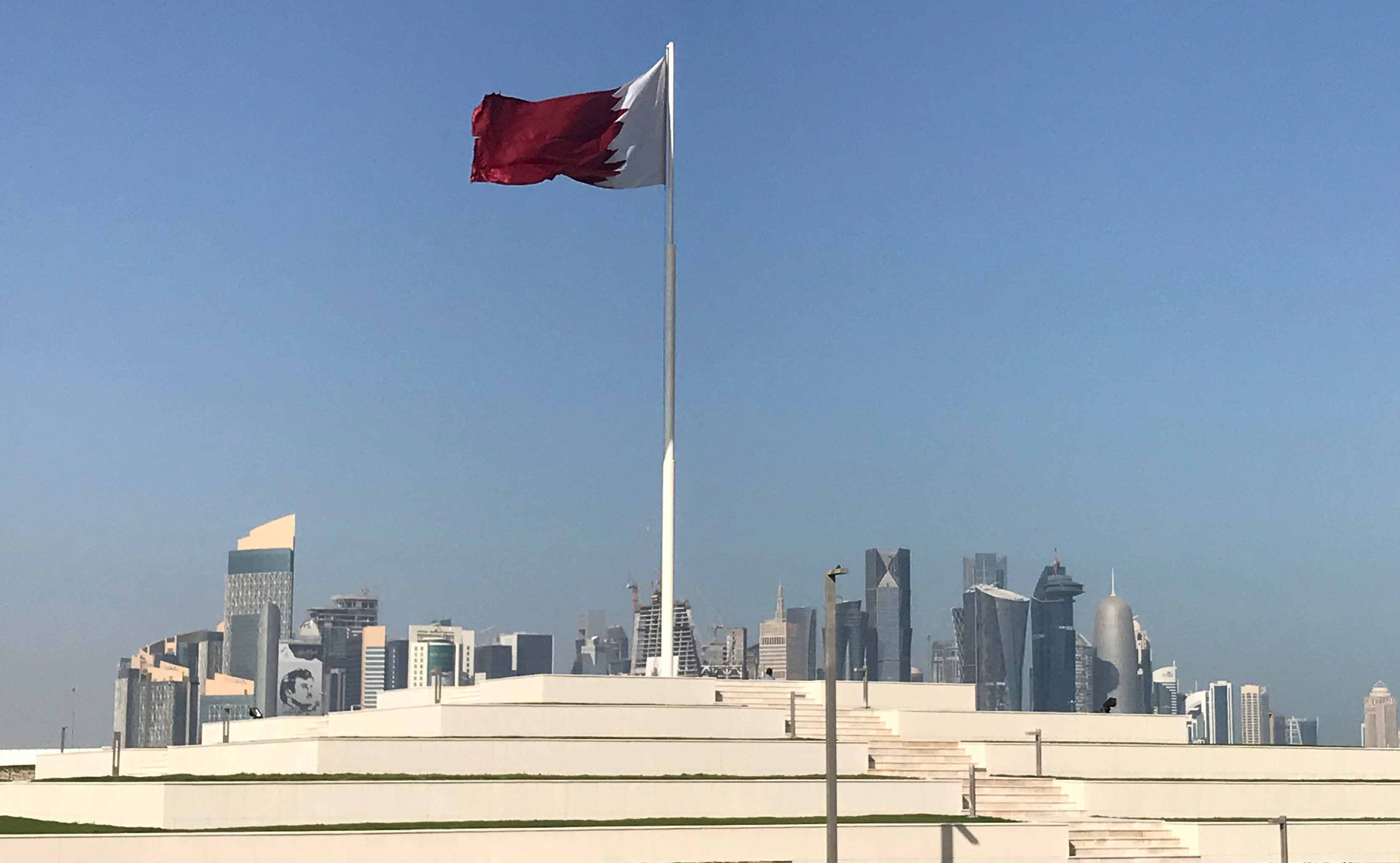 FILE PHOTO: The Qatari flag is seen at a park near Doha Corniche, in Doha