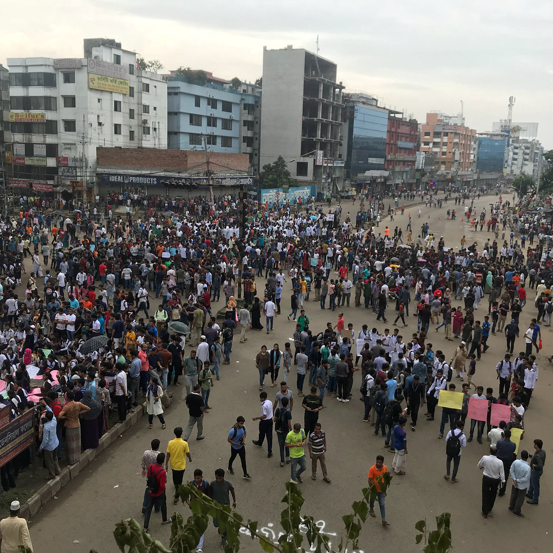 People and students protest over recent traffic accidents that killed a boy and a girl in Dhaka