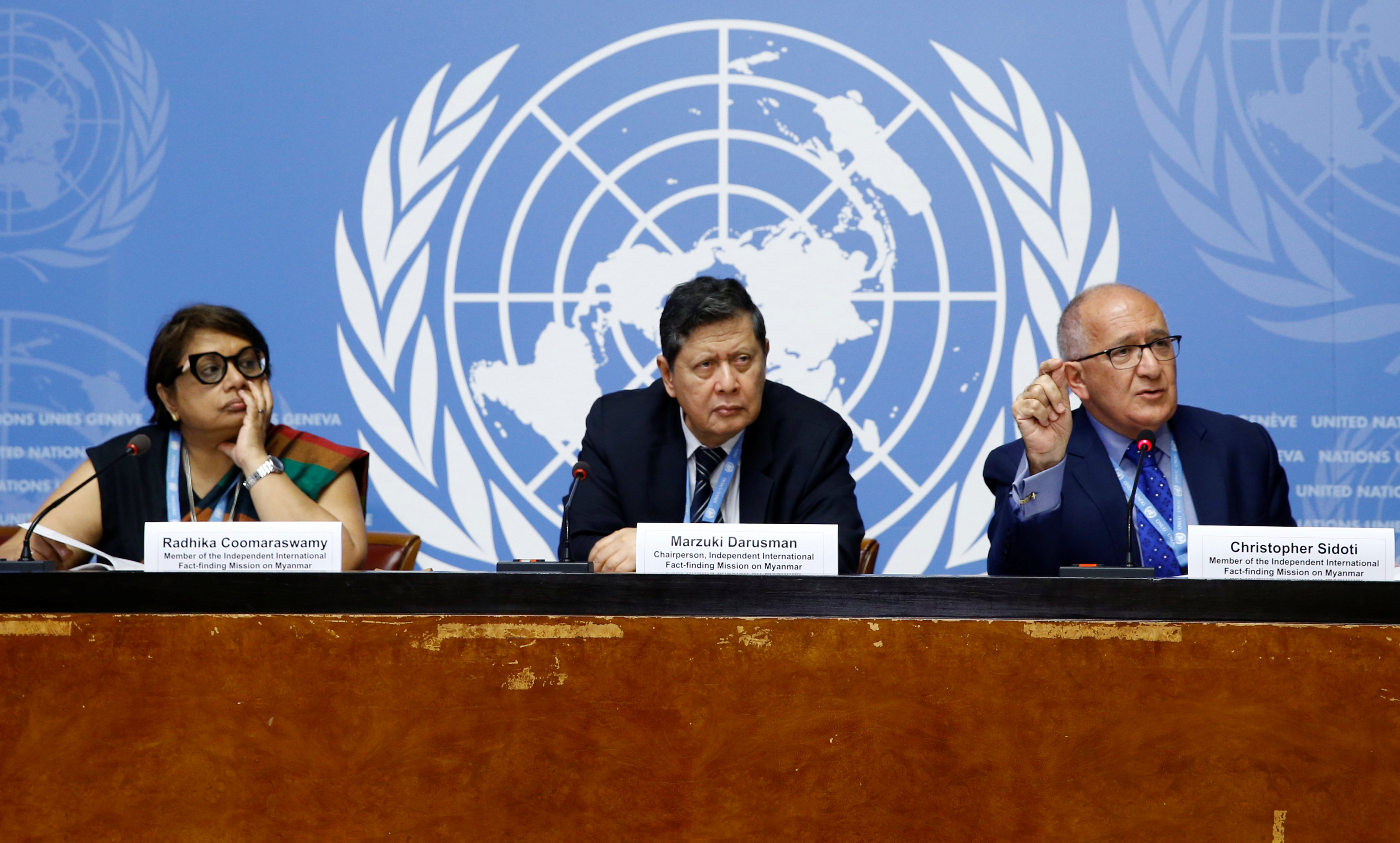 Members of the  Independent International Fact-finding Mission on Myanmar attend a news conference at the UN in Geneva