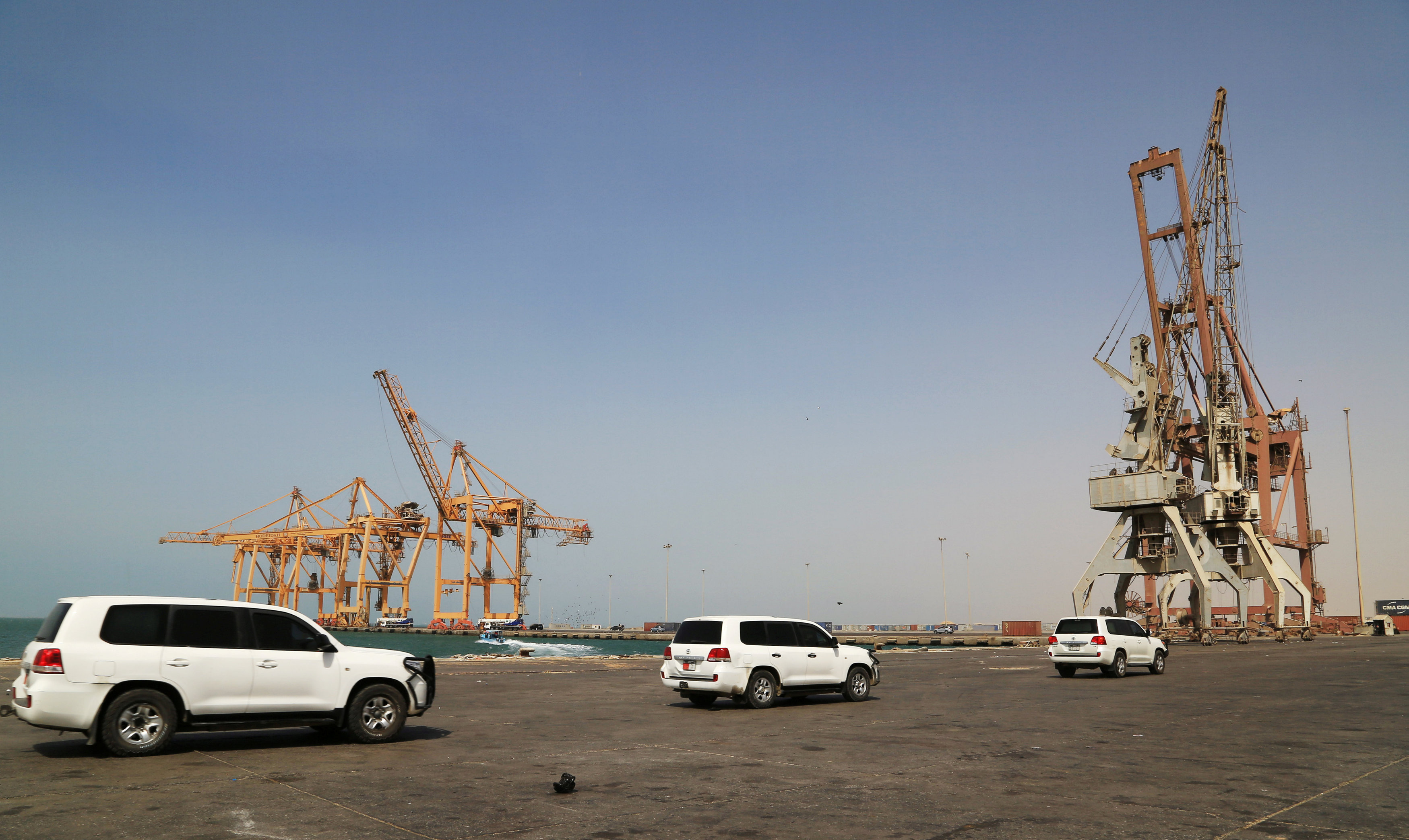 A convoy of vehicles transporting U.N. envoy to Yemen Martin Griffiths drive during a visit to the Red Sea port of Hodeidah