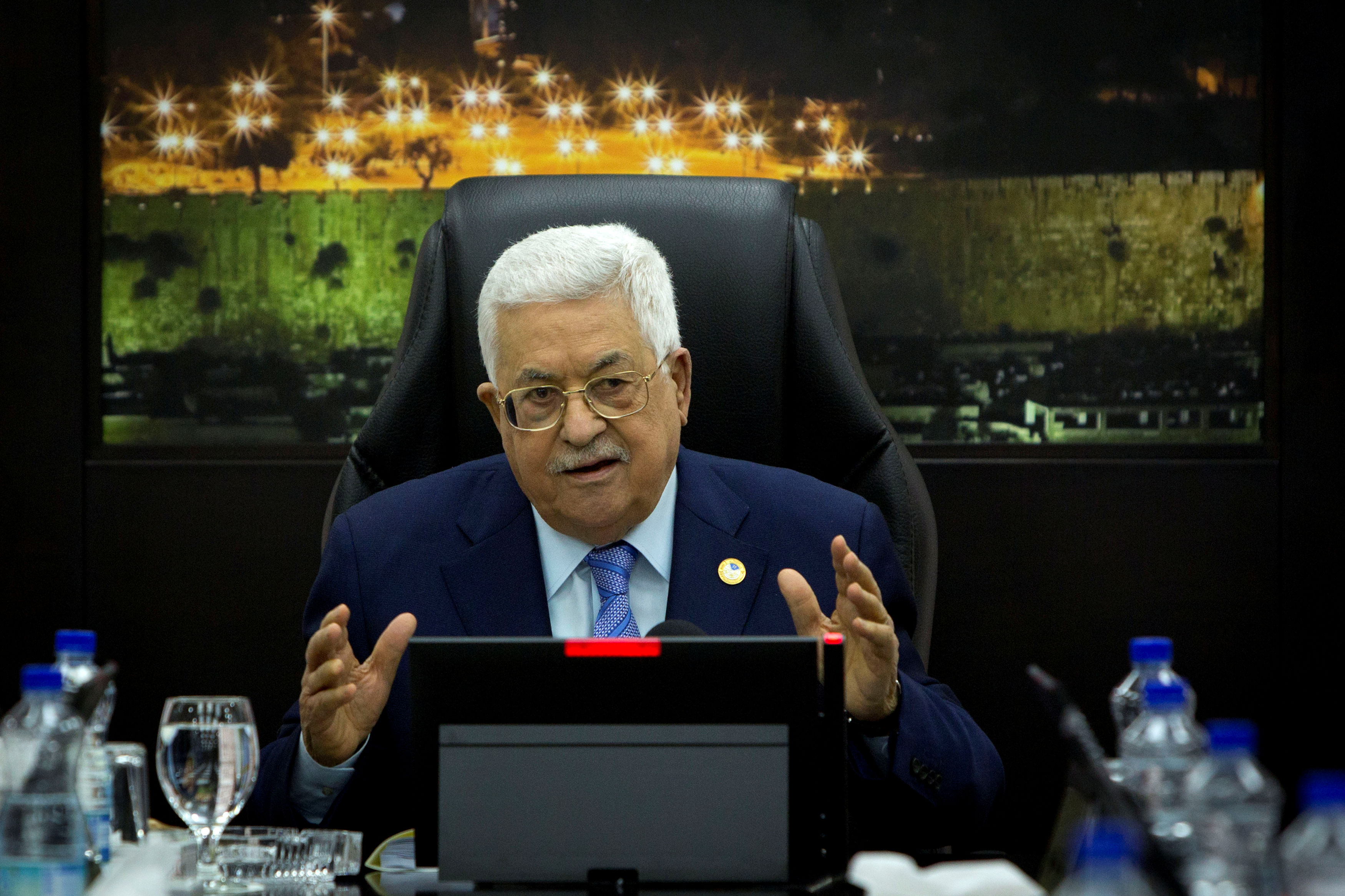 Palestinian President Mahmoud Abbas chairs a session of the weekly cabinet meeting, in Ramallah in the Israeli-occupied West Bank
