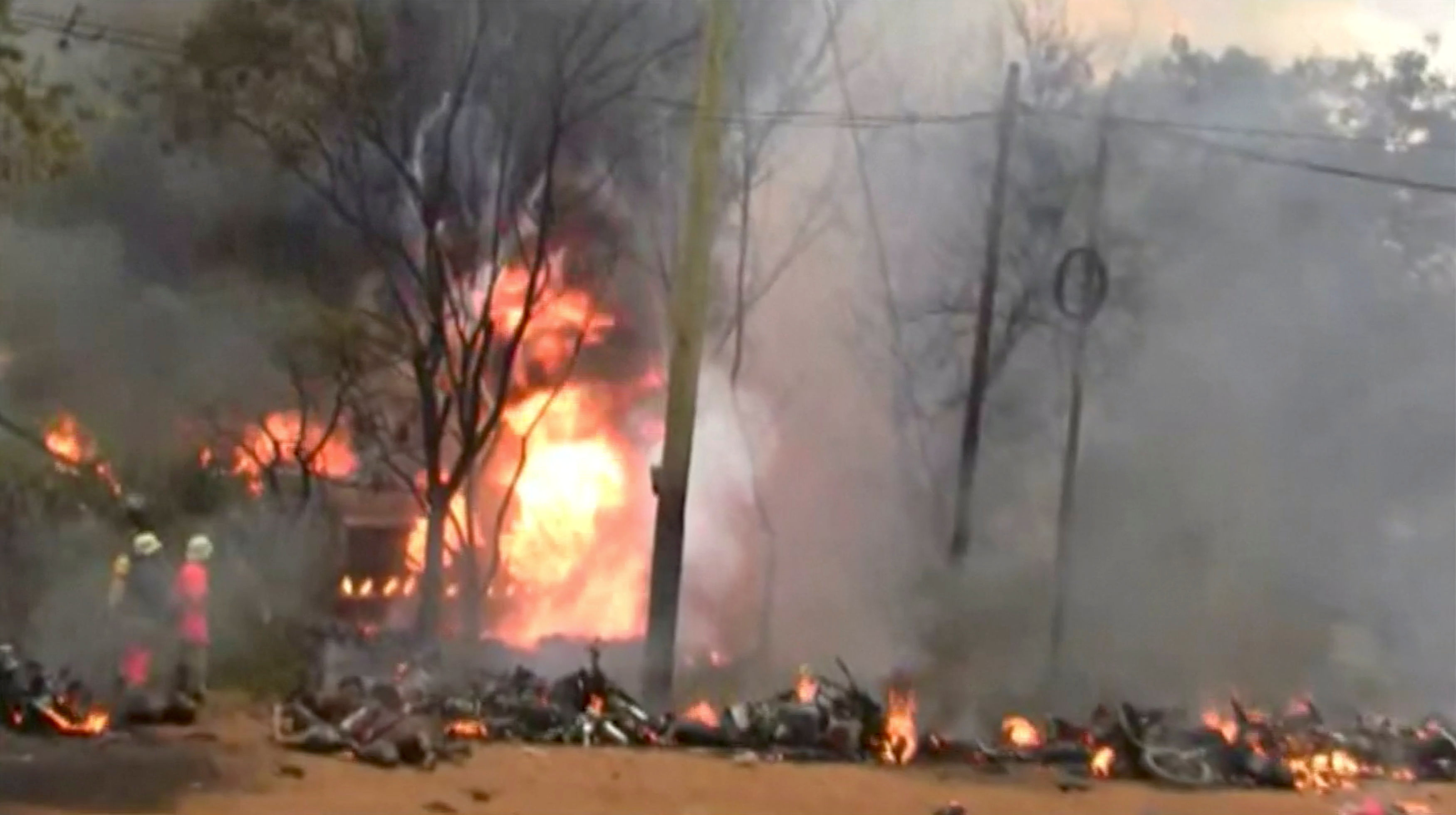 Debris burns following an explosion of a fuel tanker in Morogoro