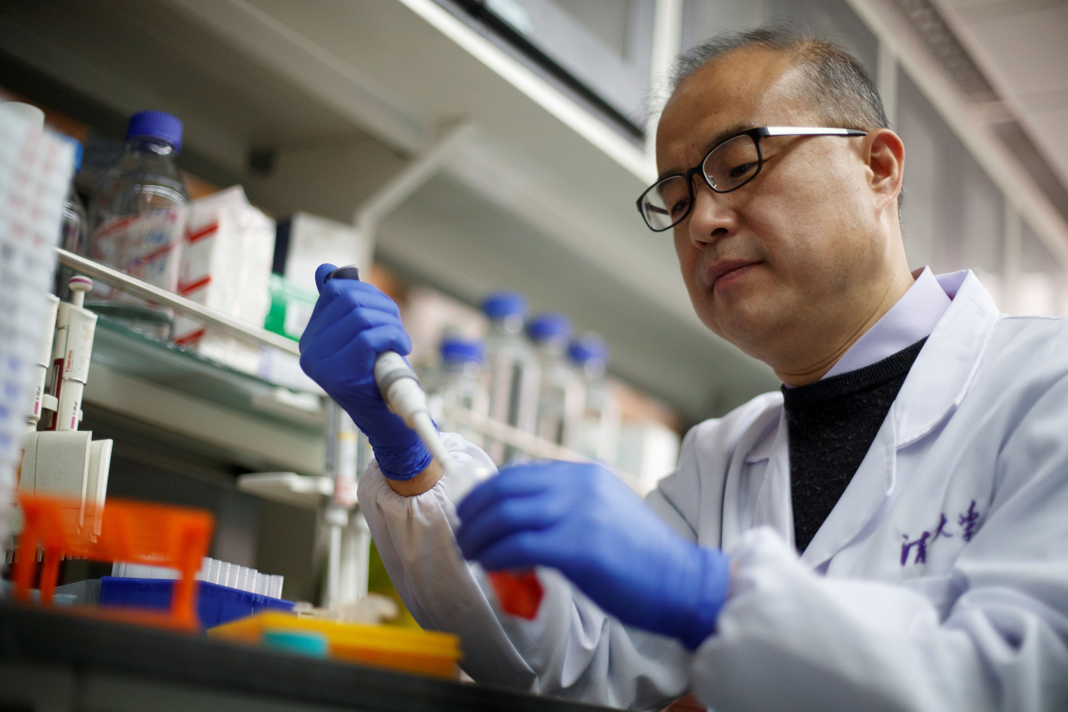FILE PHOTO: Scientist Linqi Zhang in his laboratory at Tsinghua University's Research Center for Public Health, where he is conducting research on COVID-19 antibodies