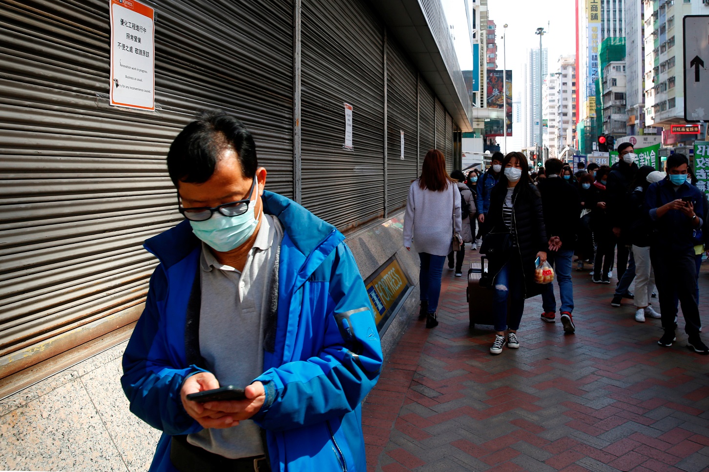A man wears a mask amid the outbreak of a new coronavirus, in Hong Kong