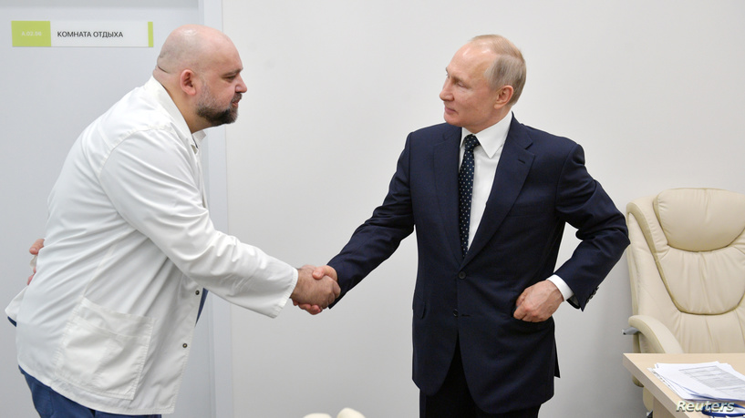 FILE PHOTO: Russian President?Putin visits a hospital for patients infected with coronavirus disease on the outskirts of Moscow