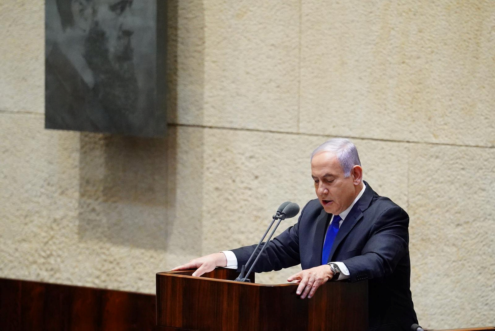 Israeli Prime Minister Netanyahu speaks during a swearing in ceremony of his new unity government at Israel's parliament in Jerusalem