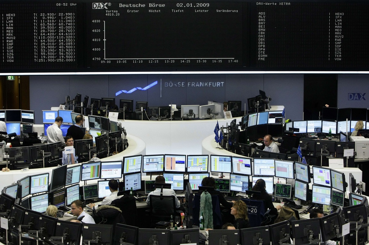 Traders prepare for first notation at beginning of first trading day in 2009 in front of DAX board at Frankfurt stock exchange