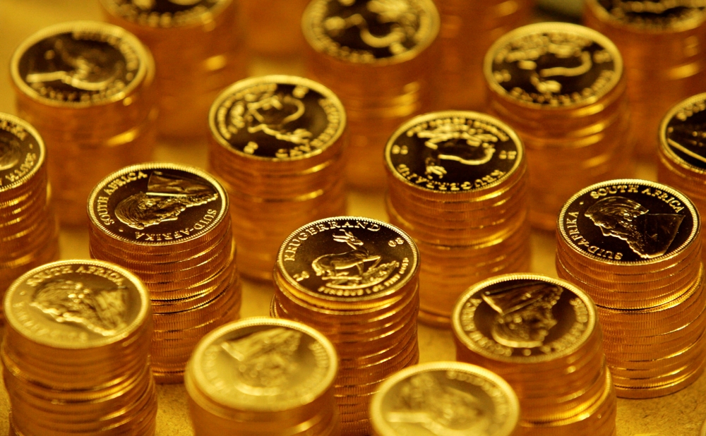 FILE PHOTO: Gold bullion coins known as Krugerrands are pictured in the mint where they are manufactured in Midrand outside Johannesburg
