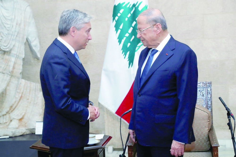 Lebanon's President Michel Aoun meets with Canadian Foreign Minister Francois-Philippe Champagne at the presidential palace in Baabda
