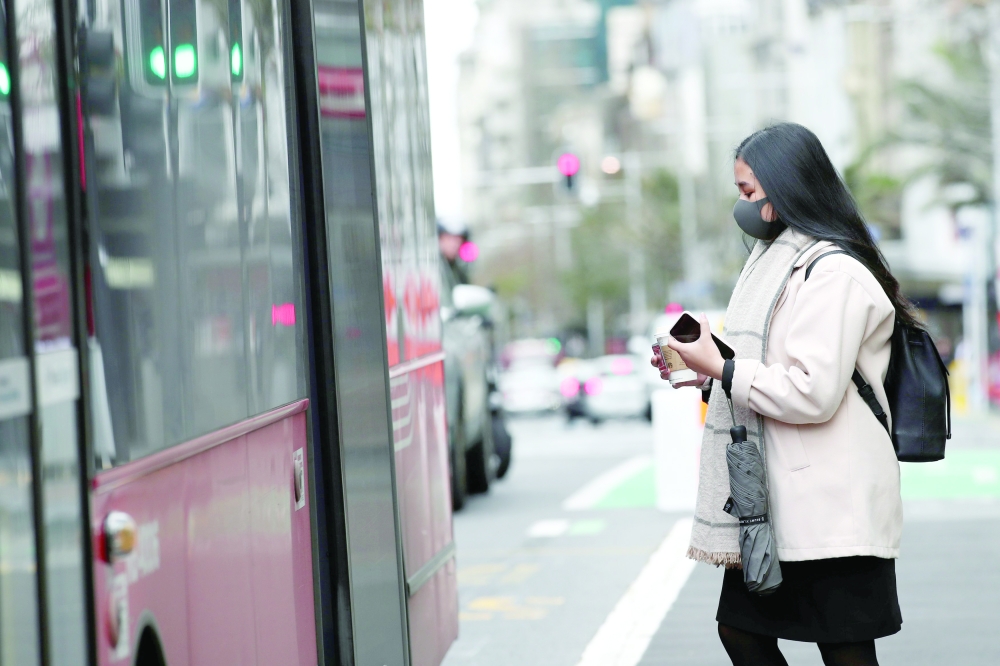 New Zealand's COVID-19 safety measure mandating masks on public transport takes effect in Auckland