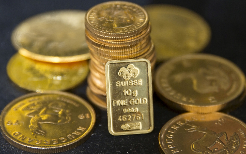 FILE PHOTO: Gold bullion is displayed at Hatton Garden Metals precious metal dealers in London, Britain