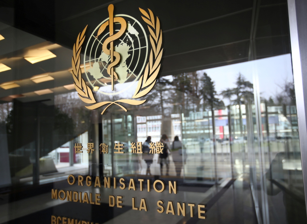 FILE PHOTO: A logo is pictured outside a building of the WHO in Geneva