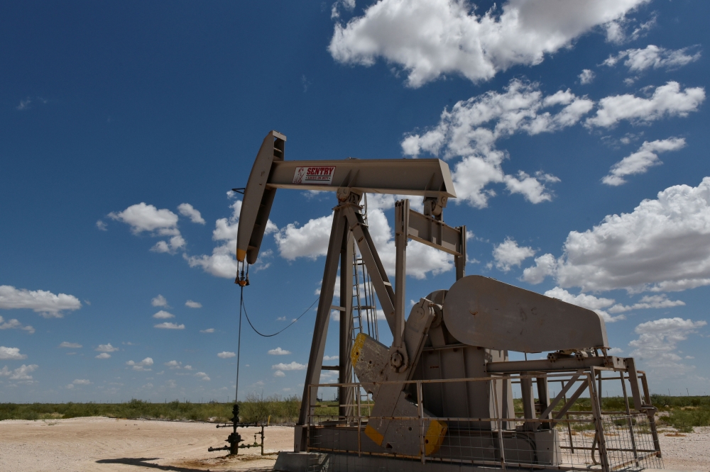 FILE PHOTO: A pump jack operates in the Permian Basin oil production area near Wink, Texas