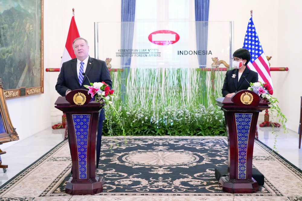 U.S. Secretary of State Mike Pompeo talks while making a joint media statement with Indonesian Foreign Minister Retno Marsudi following their meeting in Jakarta